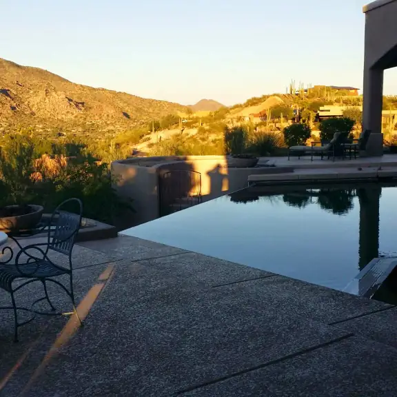 Pool at sunset with glowing mountains